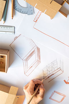 Maquette de fabrication de boîte en carton dessinée par un designer
